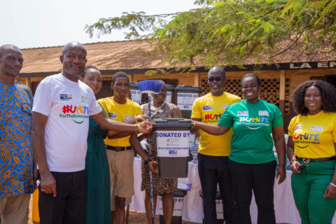 The-Human-Resources-Manager-of-Vivo-Energy-Ghana-Mercy-Amoahright-presenting-cleaning-items-to-the-Head-Teacher-of-the-La-Enobal-Basic-School