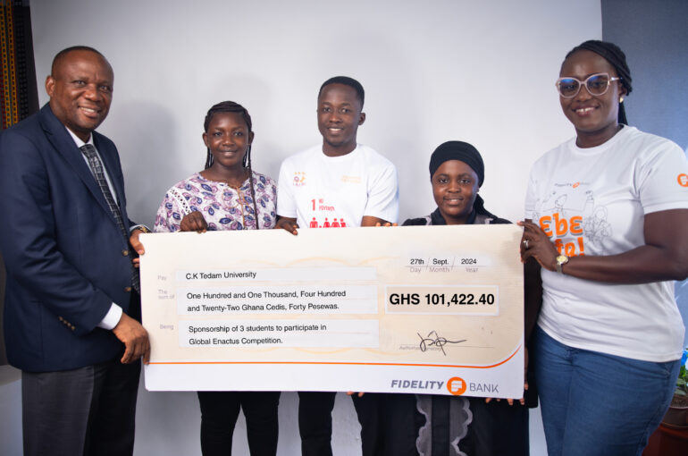 Majorie-Quansah-CSR-Coordinator-Fidelity-Bank-presenting-the-cheque-to-Professor-Albert-Luguterah-Vice-Chancellor-of-C.K.-Tedam-UTAS-and-the-UTAS-Enactus-team