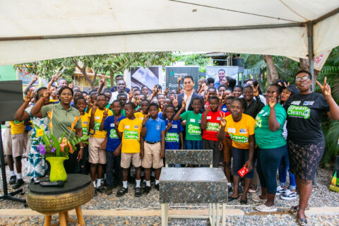 A group picture of Christian Li, MD of Vivo Energy Ghana and the pupils from La Enobal Basic School during the educational visit at Mckingtorch Africa.