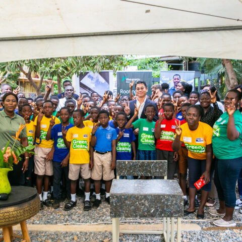 A group picture of Christian Li, MD of Vivo Energy Ghana and the pupils from La Enobal Basic School during the educational visit at Mckingtorch Africa.